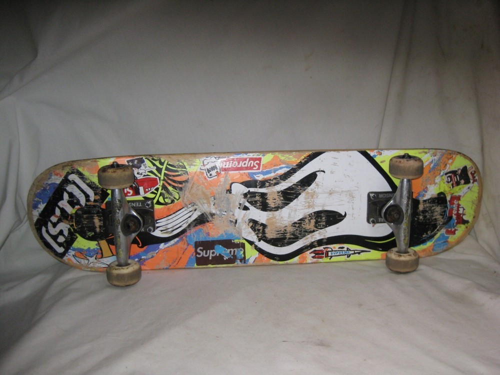pre-owned skateboard Tensor trucks Psychedelic wheels Blind grim reaper deck