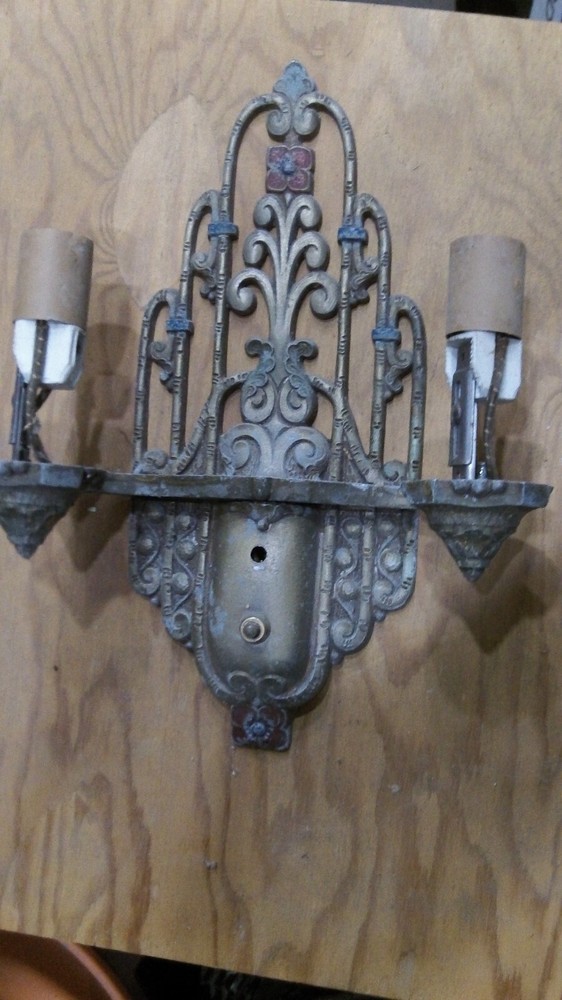 Vintage Lighting Seven sconces by Riddle!