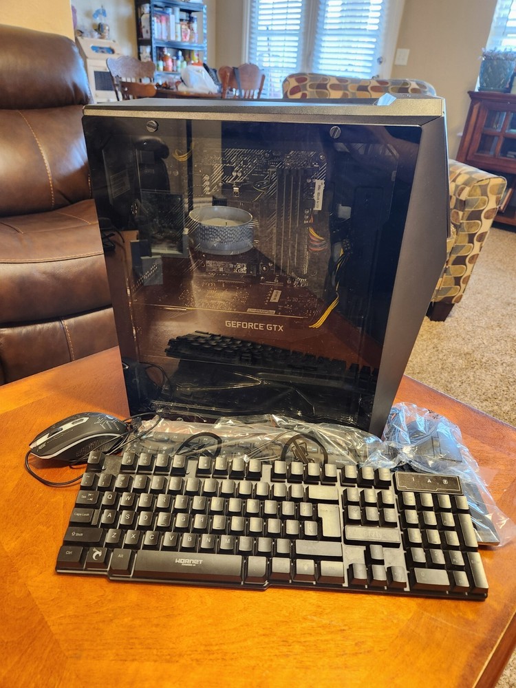 Asus Gaming Desktop W/ Gaming Keyboard and Mouse Plus speakers.