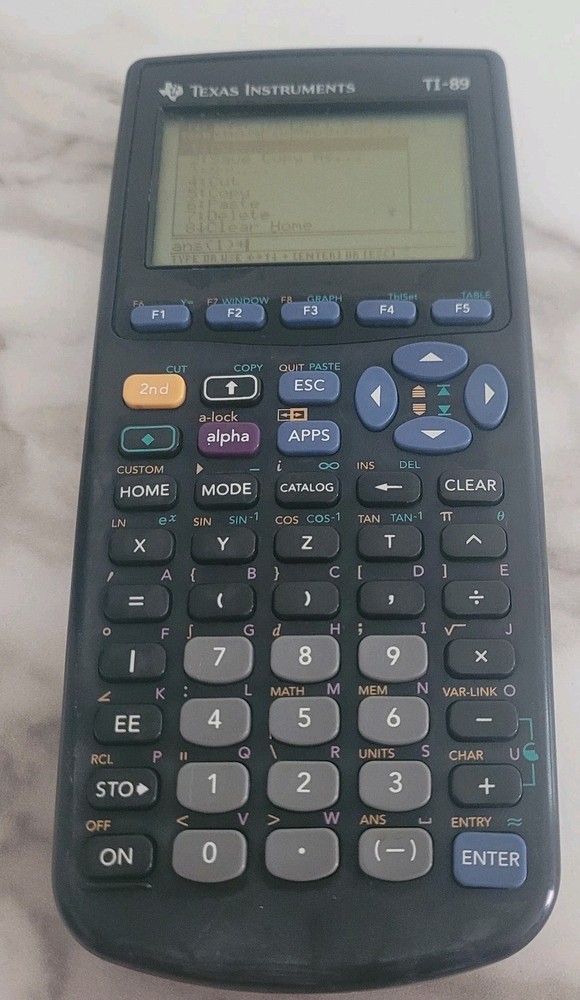 Texas Instruments TI-89 Calculator, powers on, Unknown if fully functional
