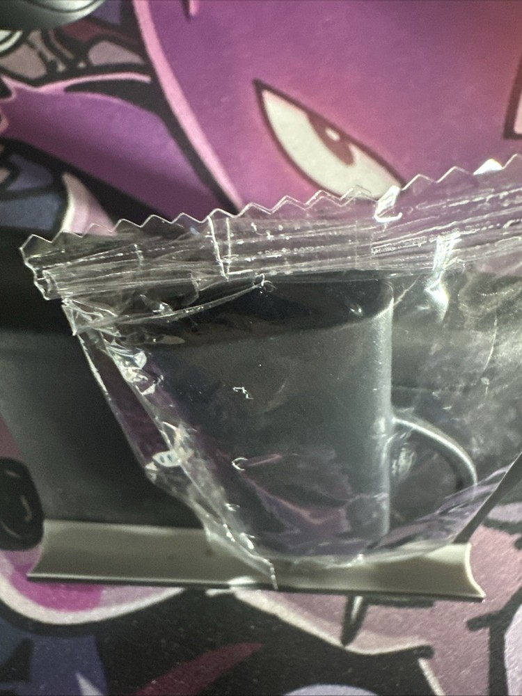 Black Lighter Holder Goes Around Cigarette Pack