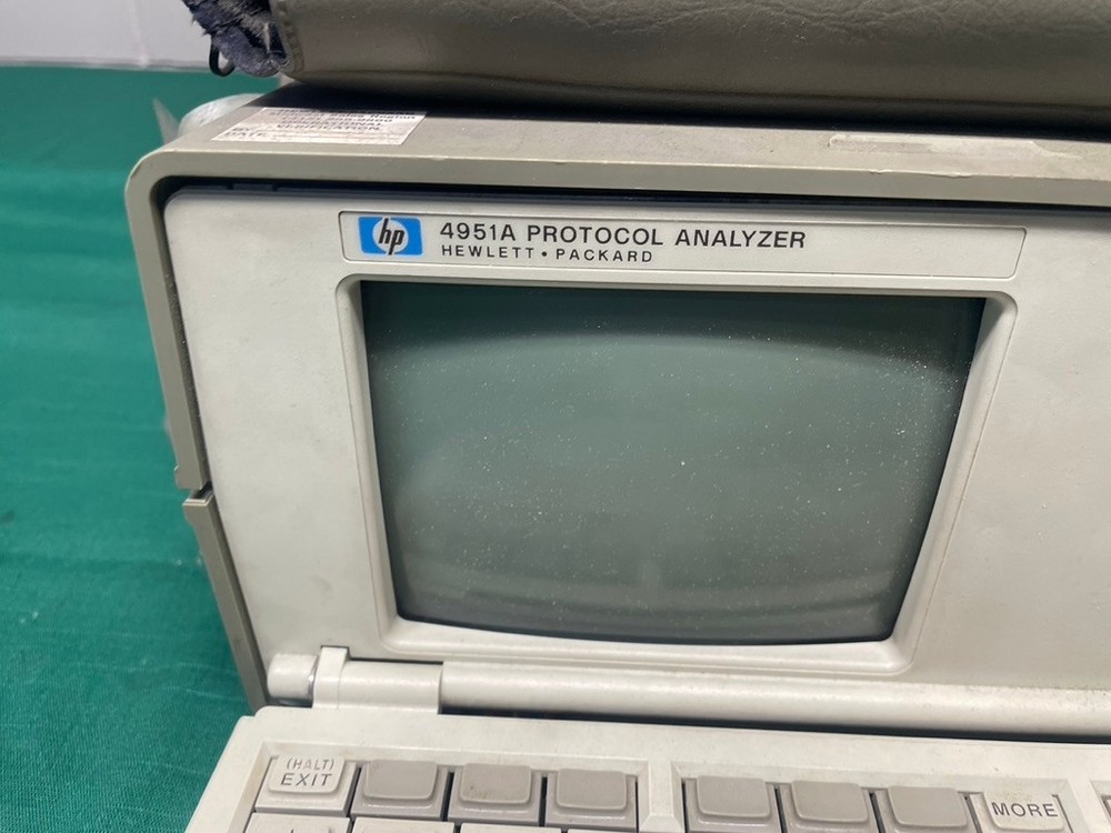 Hewlett Packard HP 4951A protocol analyzer with accessories 18180A interface