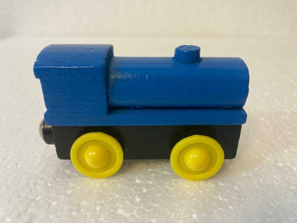 blue wooden train TAG ALONG NO FACE