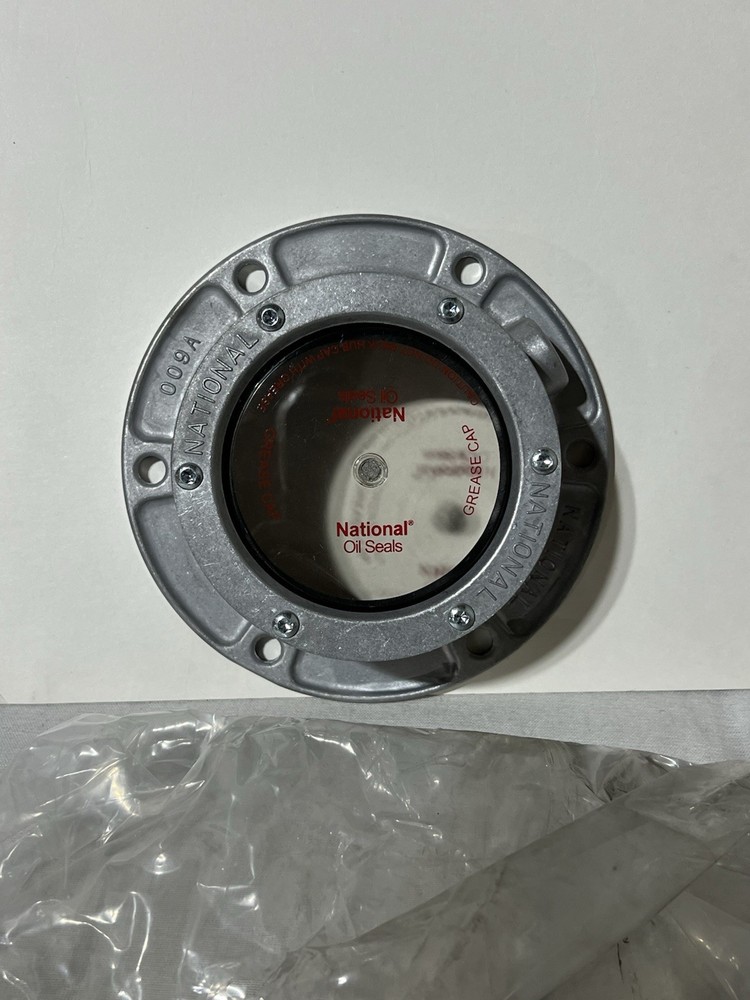 National Axle hubcap #009A-Grease Pack Style
