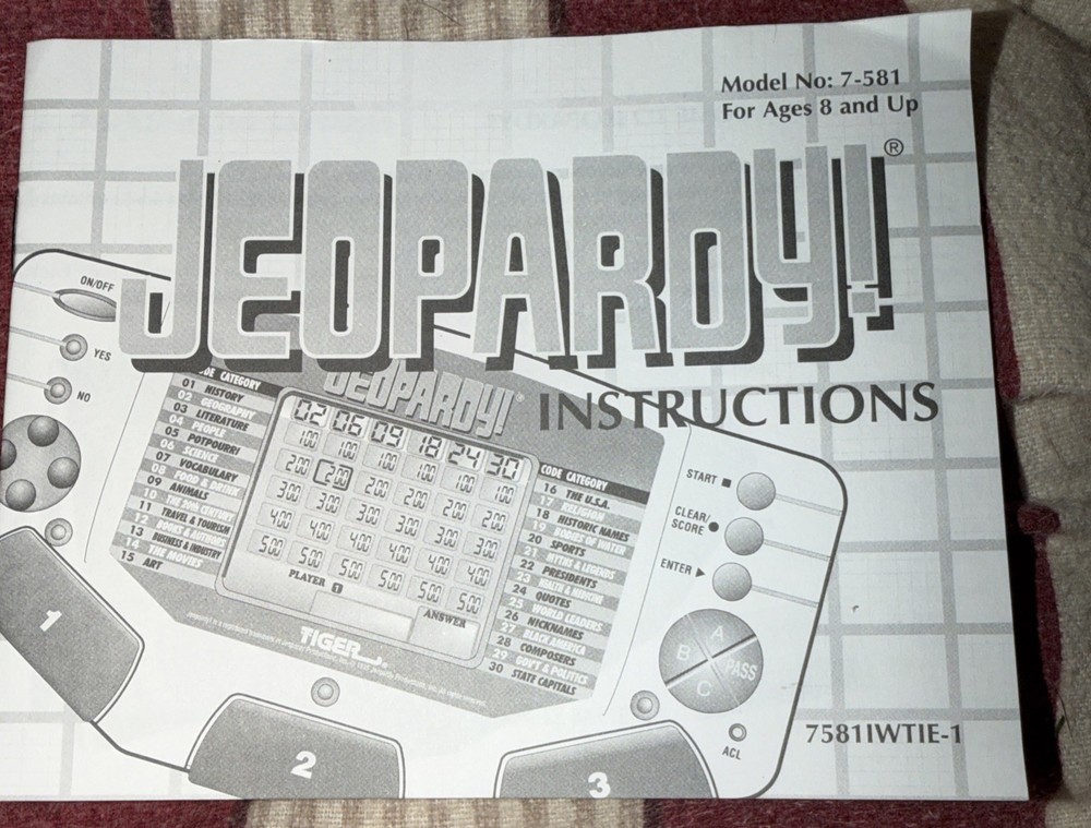 Tiger Electronics Jeopardy Handheld Game With Answer/question Book + Instruction