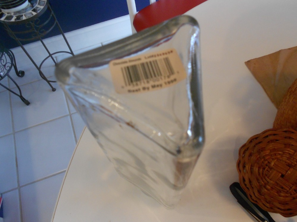 bottle with cork topper three flat sided 1999 issue 9 3/4" tall