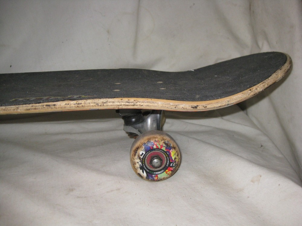 pre-owned skateboard Tensor trucks Psychedelic wheels Blind grim reaper deck