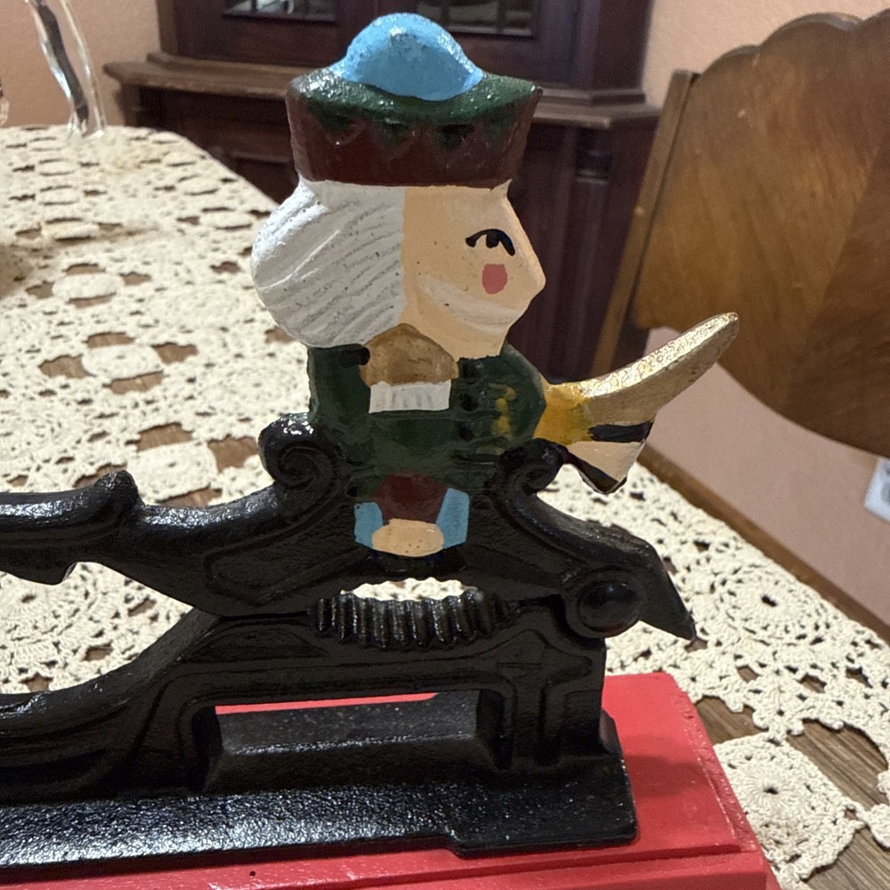 Vintage Heavy Cast Iron Nut Cracker On Red Wood Base Nutcracker Soldier