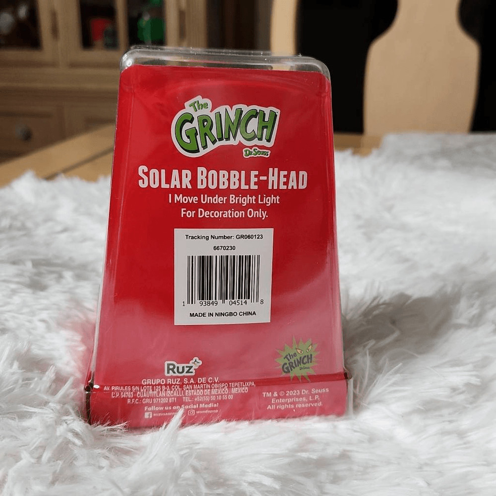 The Grinch solar Christmas bobblehead