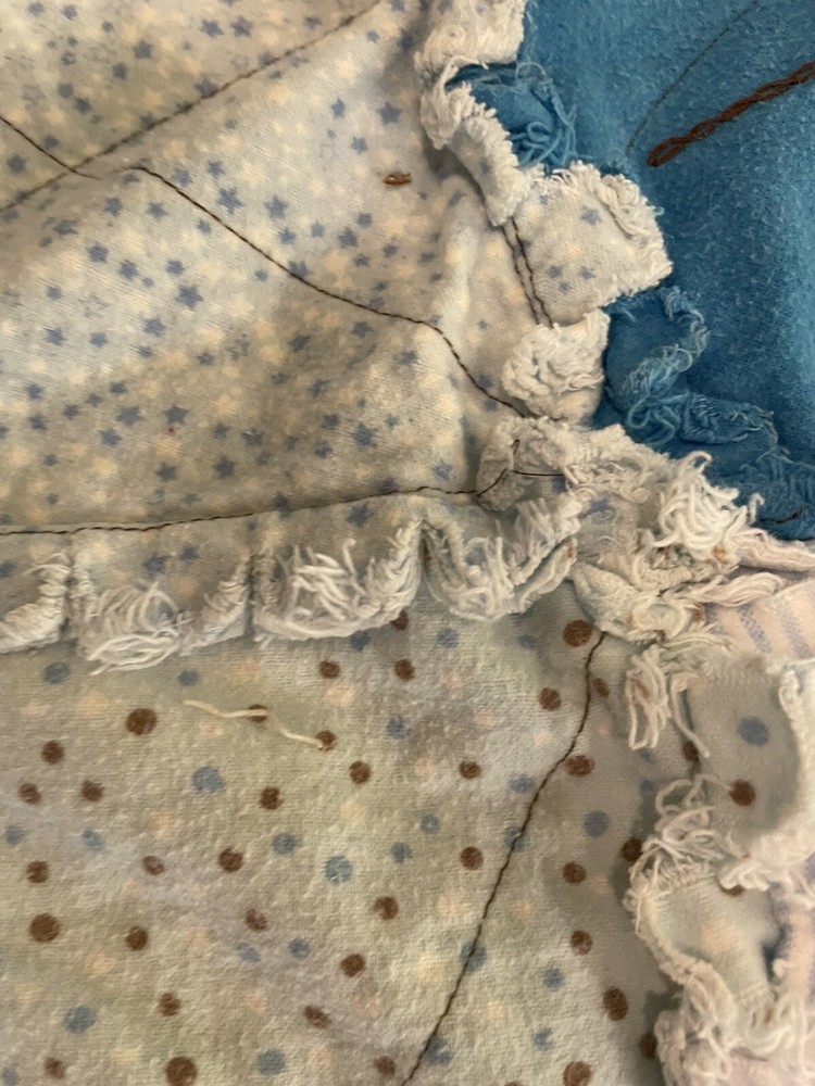 finished dog shaped rag quilt