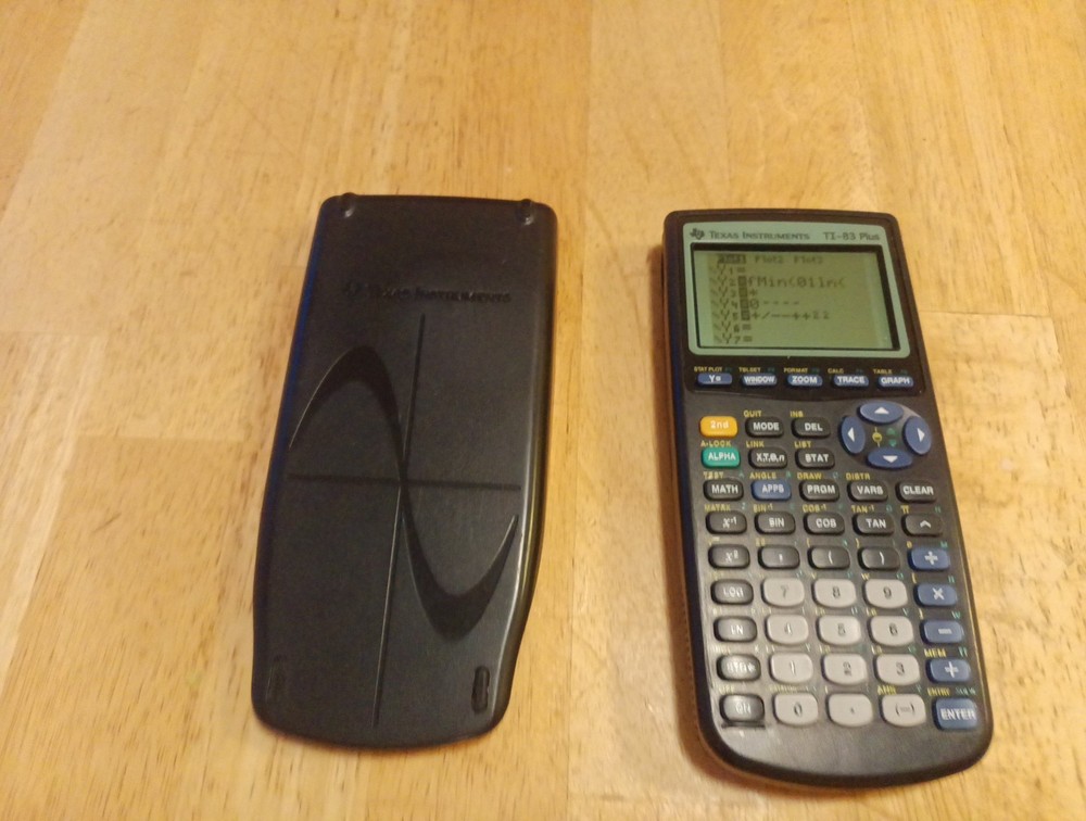 Texas Instruments TI-83 Plus Calculator (TESTED )