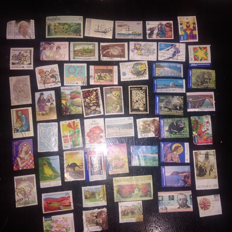 53 Australia used stamps off paper