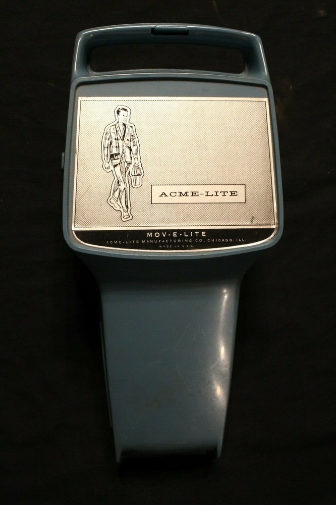 VINTAGE ACME-LITE MOV-E-LITE! TESTED AND WORKS NICE GRAPHICS ON CASE!