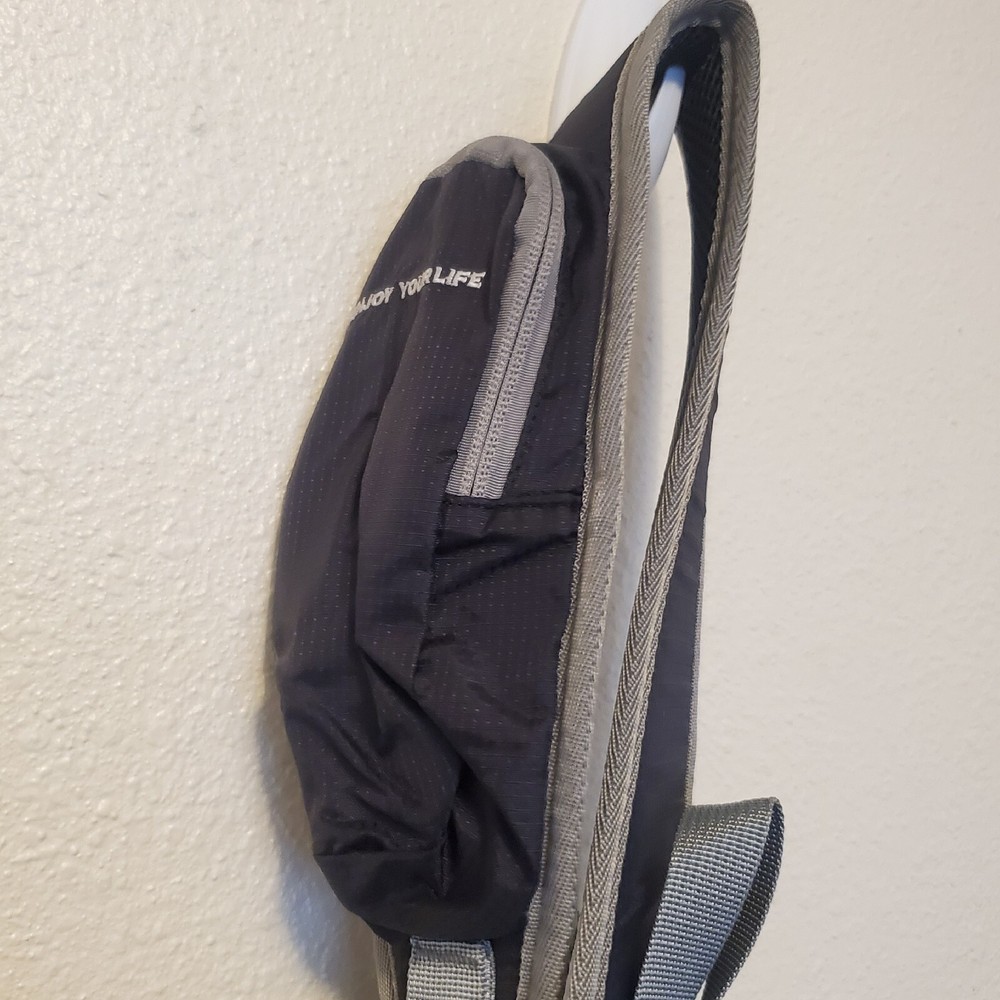 Waterfly Sling Pack - Black Gray Adjustable Strap Pockets Zippered NWT