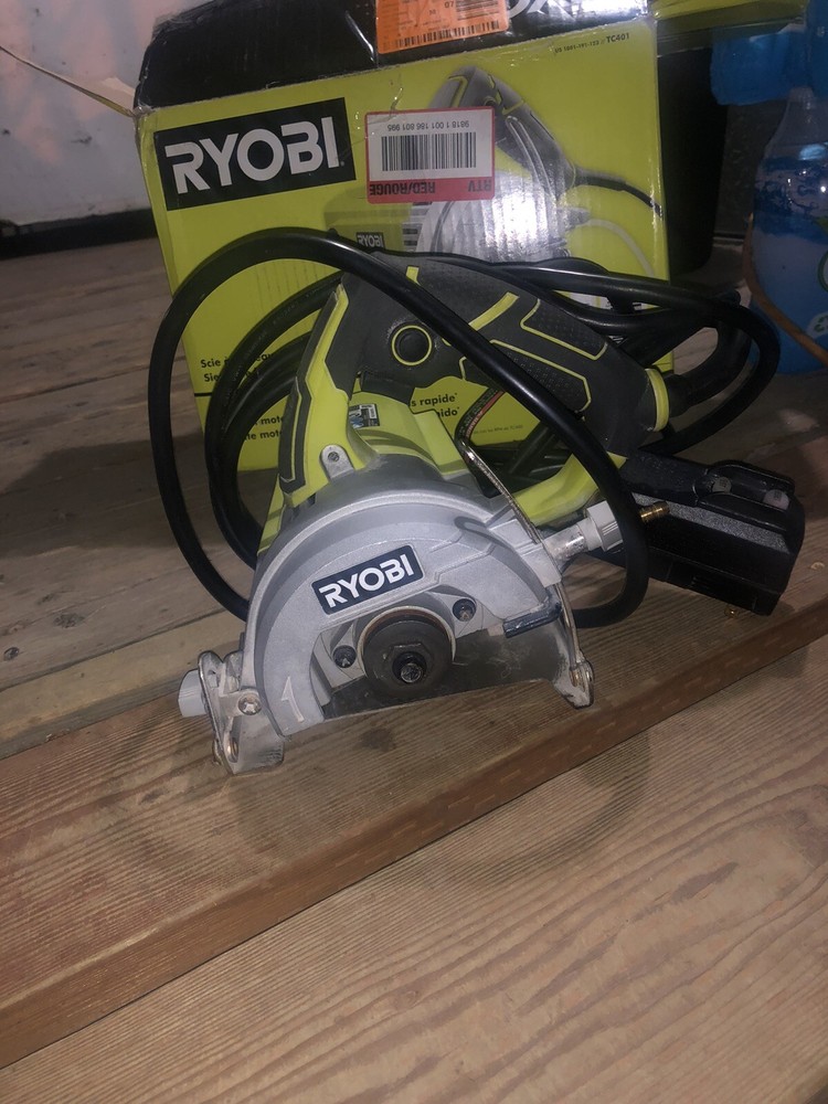 (NEW) RYOBI "4" HAND HELD TILE SAW.