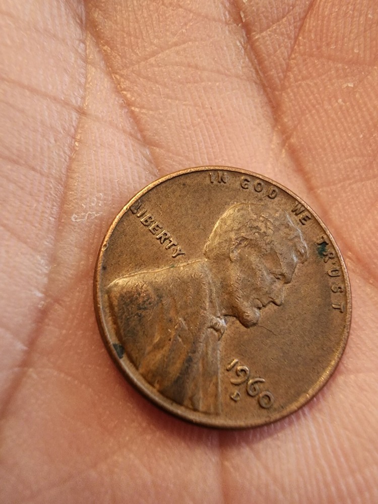 1960 penny d mint Error on L Next to Rim Rare!