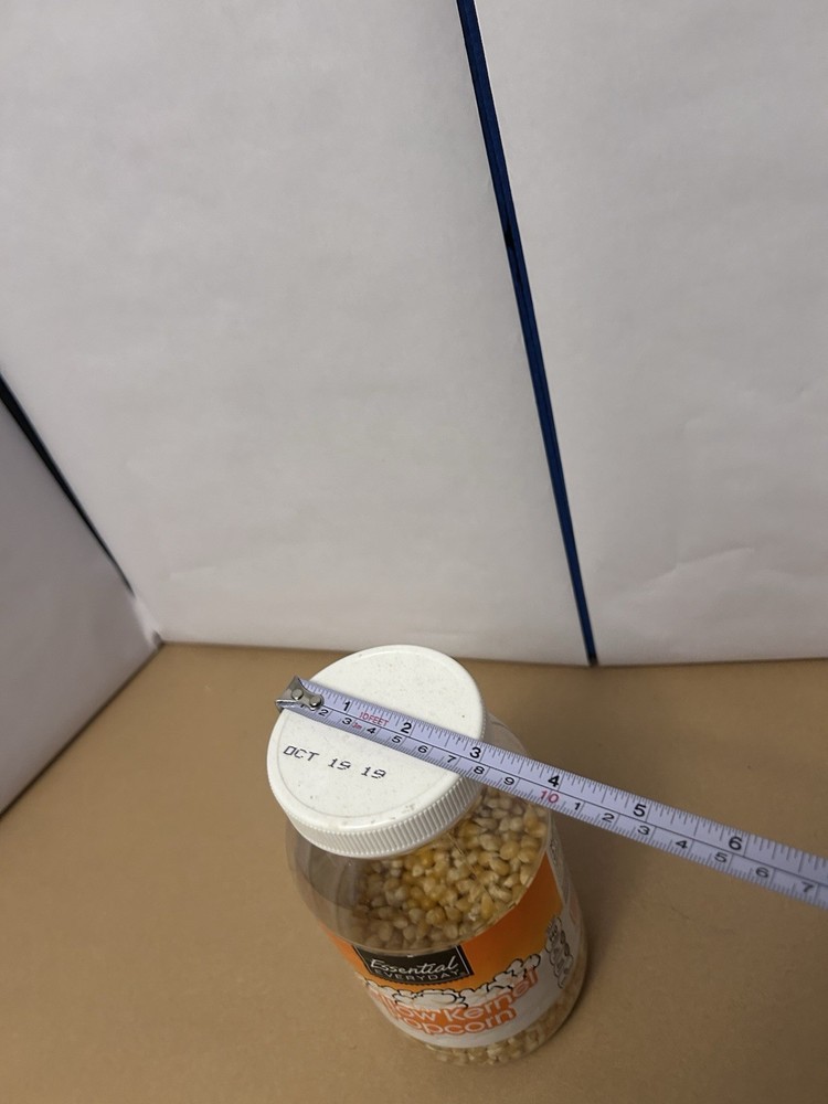 Plastic Jar 851g twist off Essential Everyday Yellow Kernel Popcorn half used