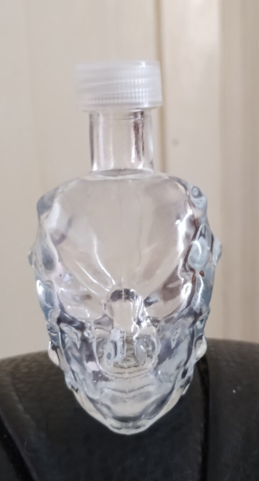 ALIEN HEAD SMALL EMPTY GLASS BOTTLE WITH SCREW ON LID