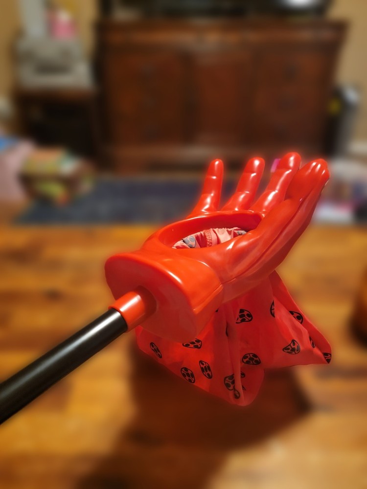Red Plastic Halloween Prop Hand with Black Accent
