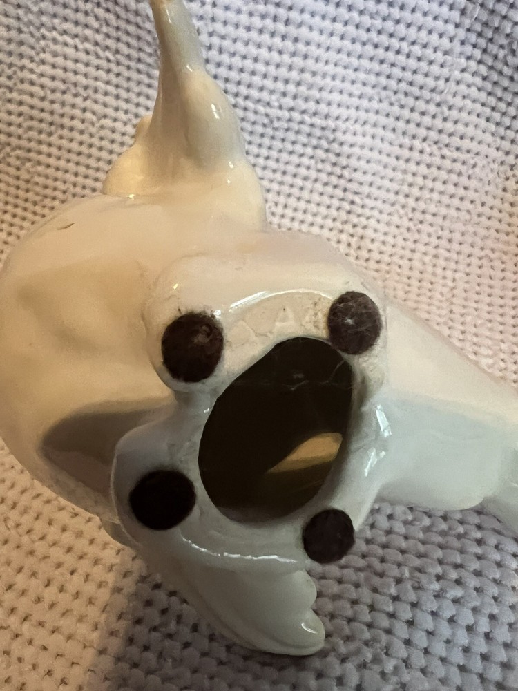 porcelain parrot figurines