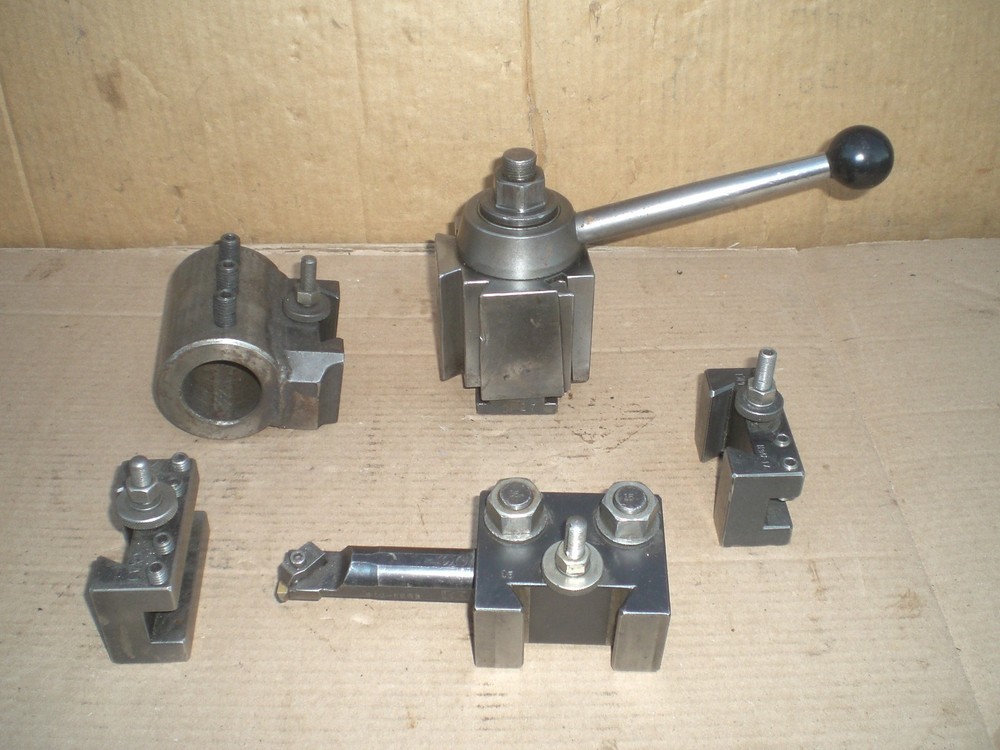 Genuine Aloris CXA tool post with 4 tool holders