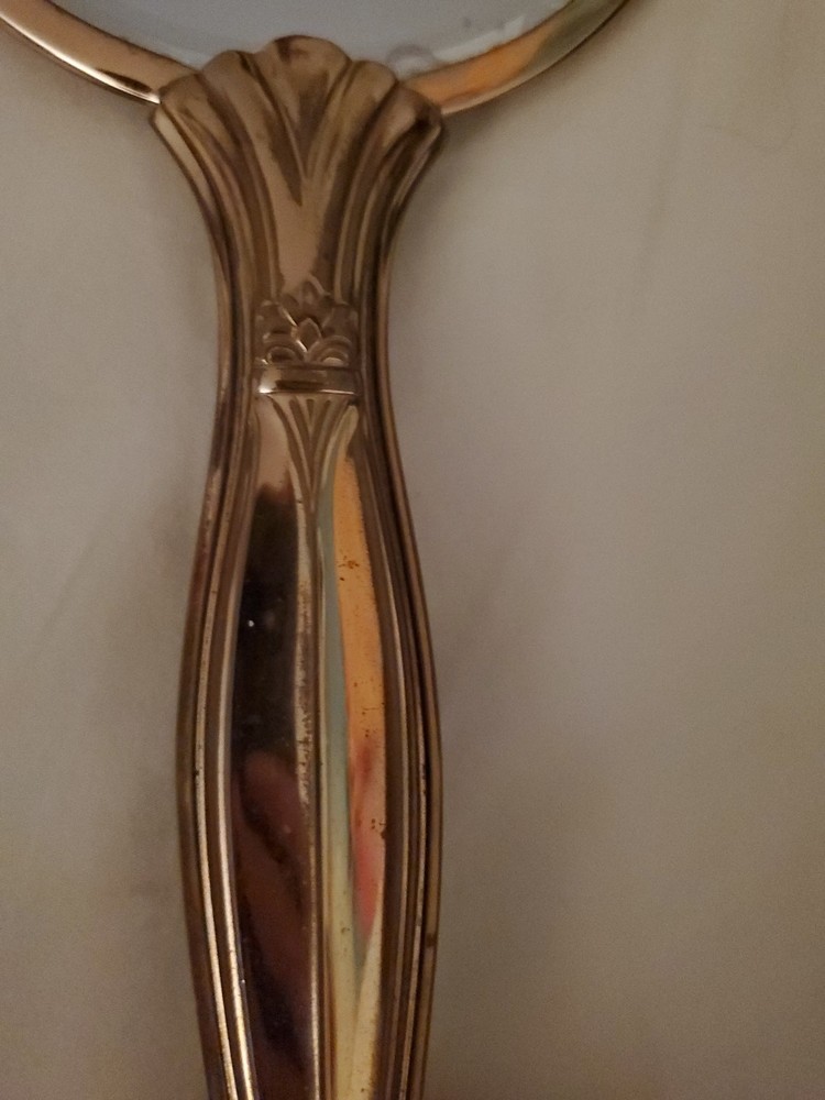 Vintage art deco brass handheld vanity mirror