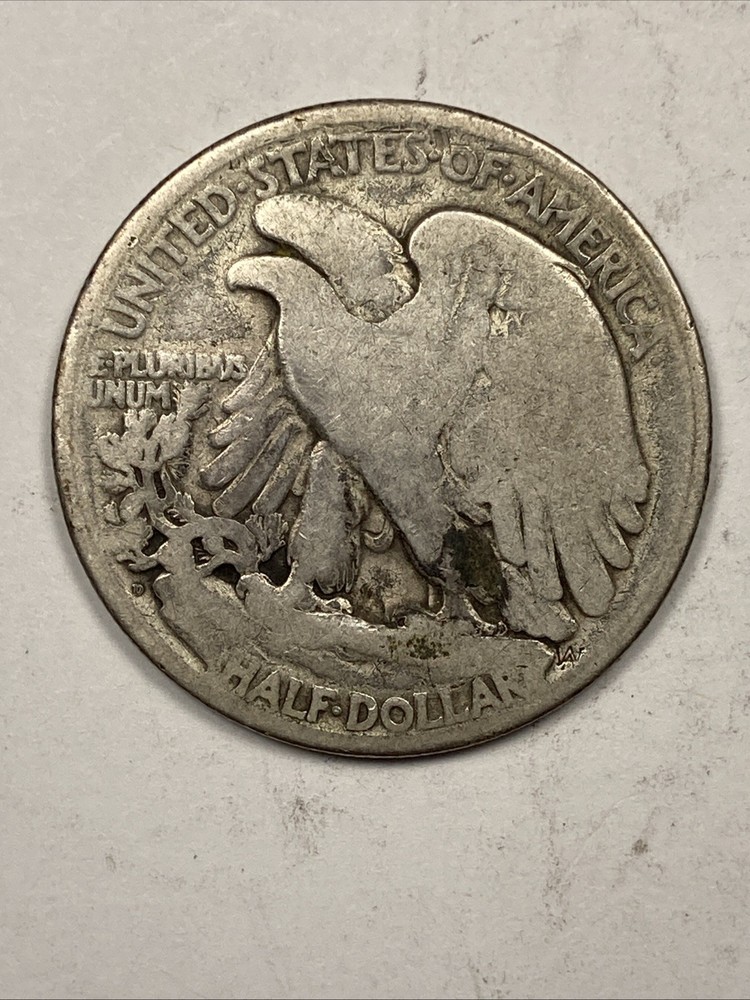 1921-D Walking liberty Half .50. Net About Good.