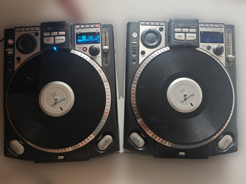 A pair of Numark CDX DJ Controller