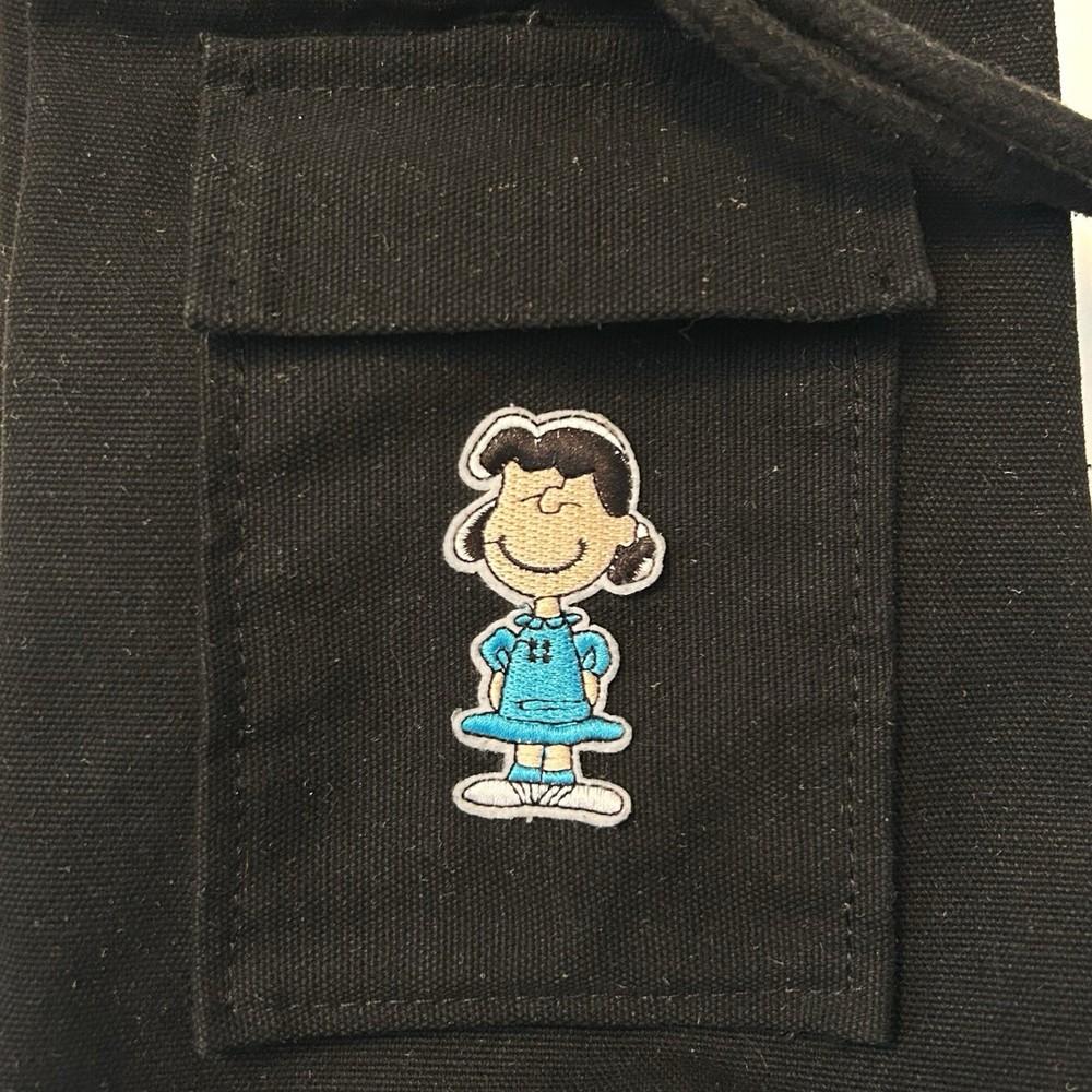 Peanuts Charlie Brown Lucy Black Canvas Drawstring Backpack Blue Patch Pocket