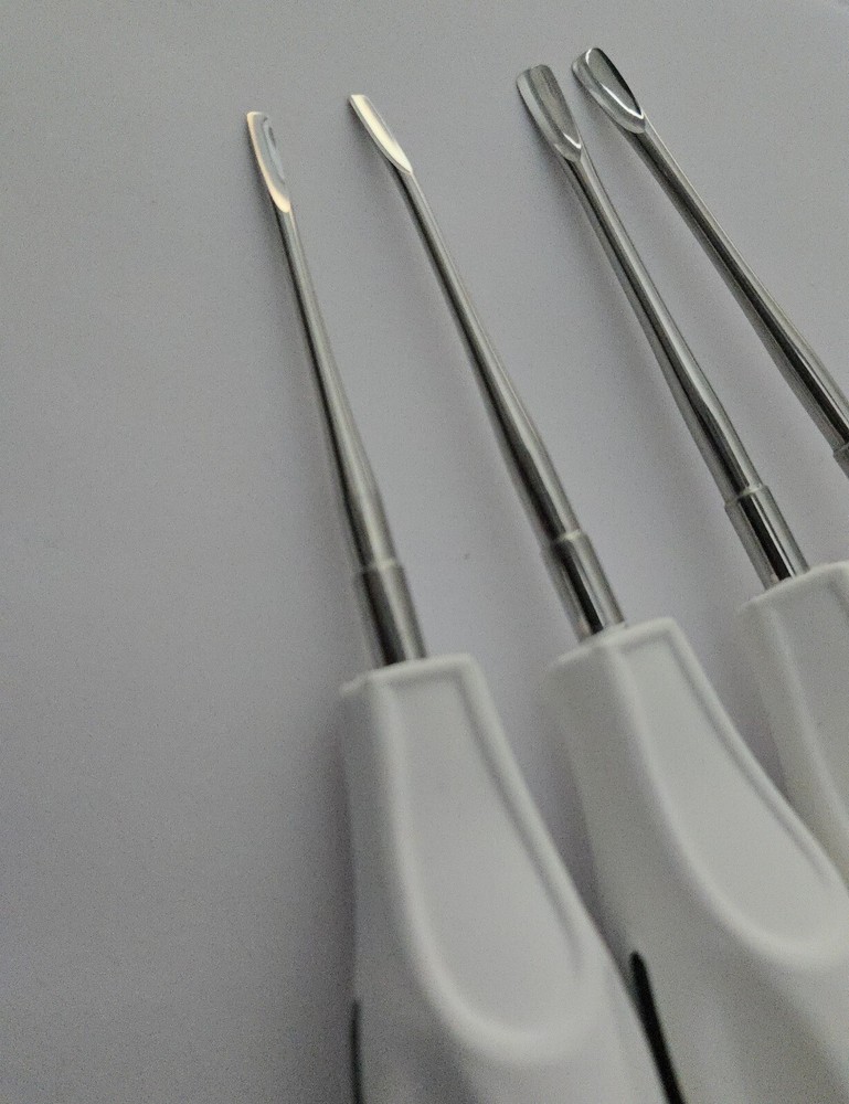 White Plastic Handle Dental Luxating Root Tip Extraction Elevator Loosen Tools