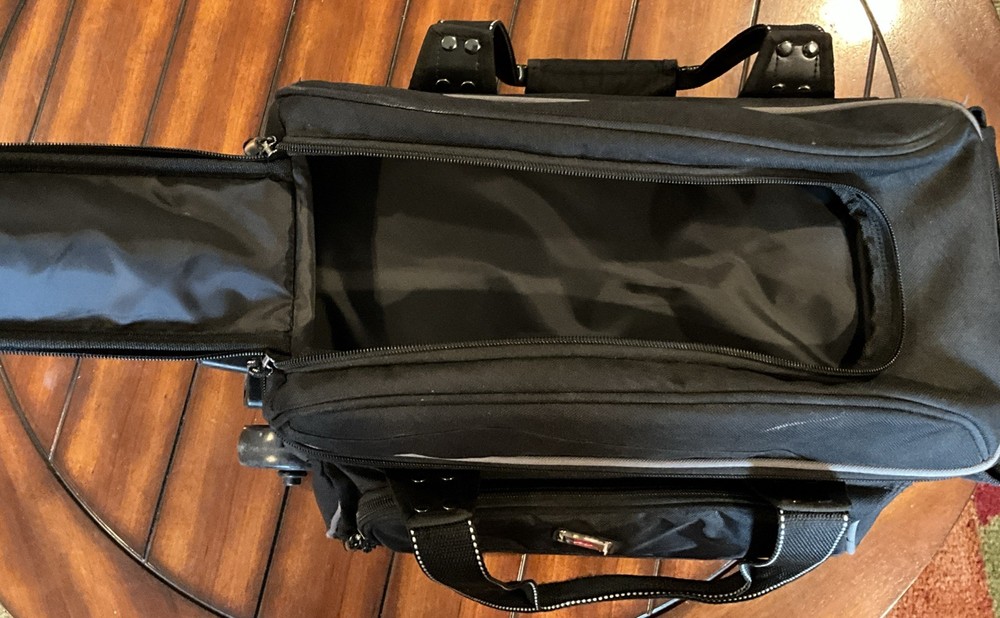2 Bowling Balls And Roller Carry Case
