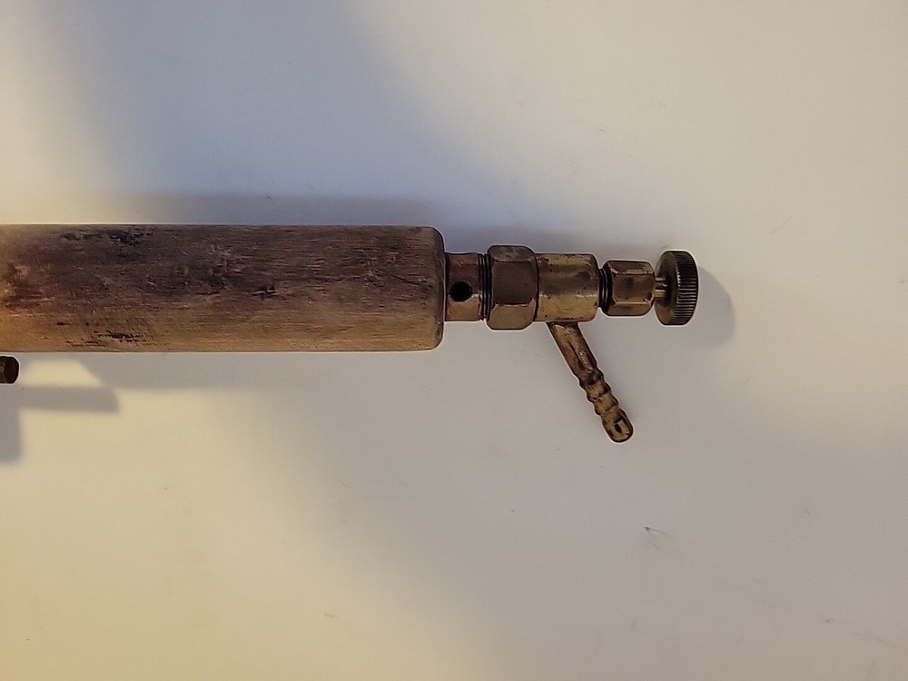 Antique Soldering Iron Blow Torch?