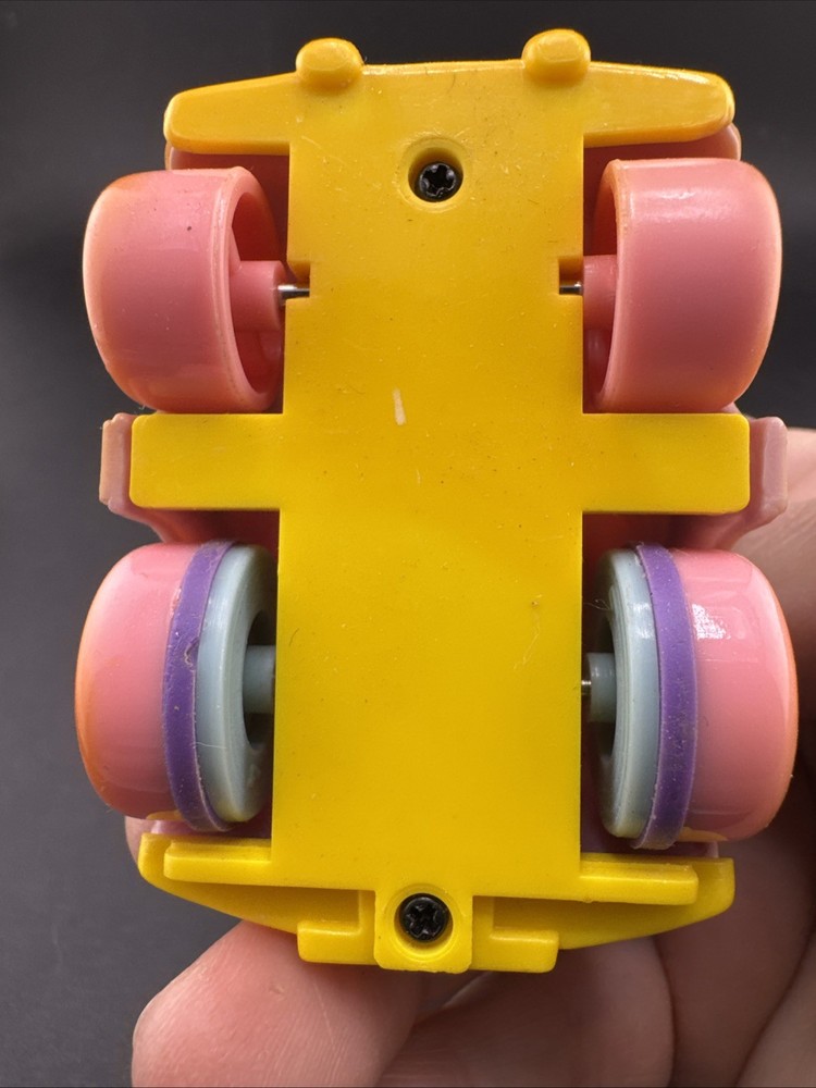 Chick Rides a Compact Car Pull Release Toy, 2.5” tall