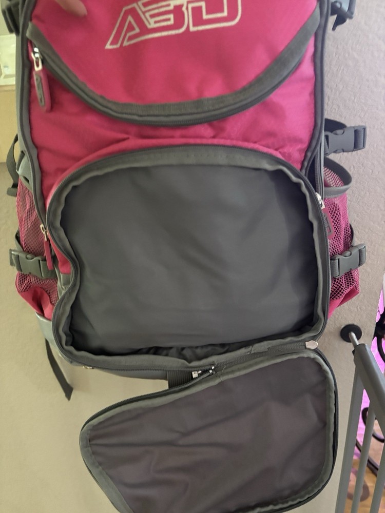Large softball backpack 2 bats Backpack bag. Excellent Condition. Grey-pink.