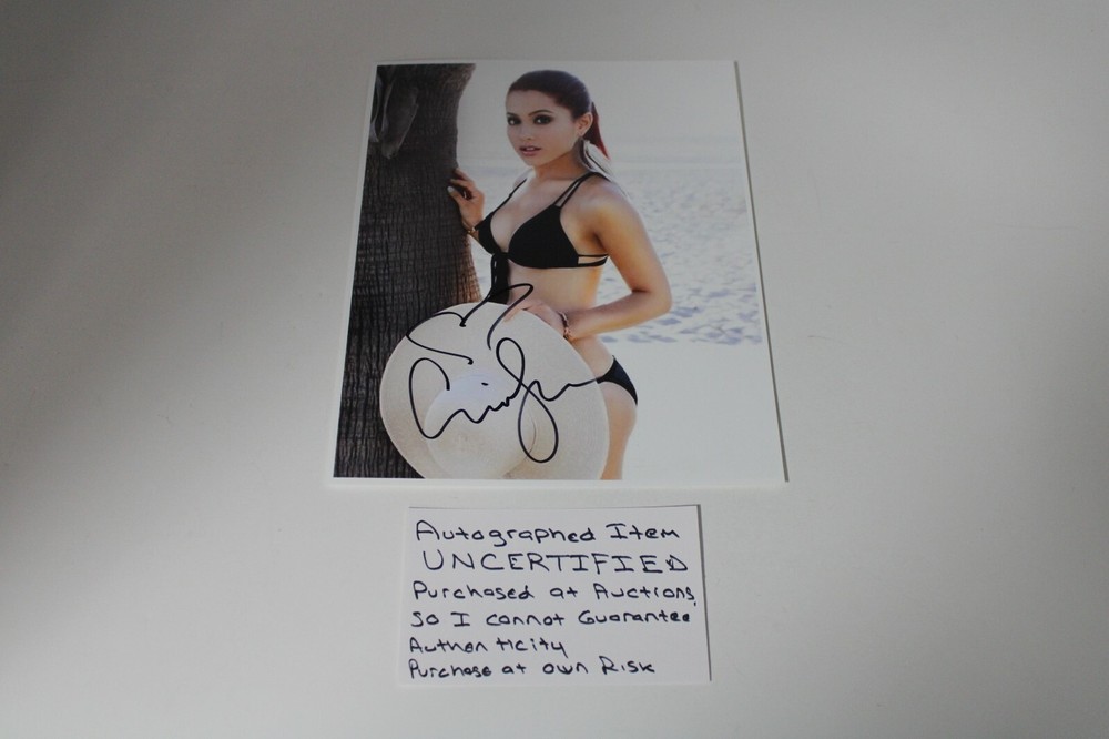 Model autographed signed UNCERTIFIED, sexy swimsuit