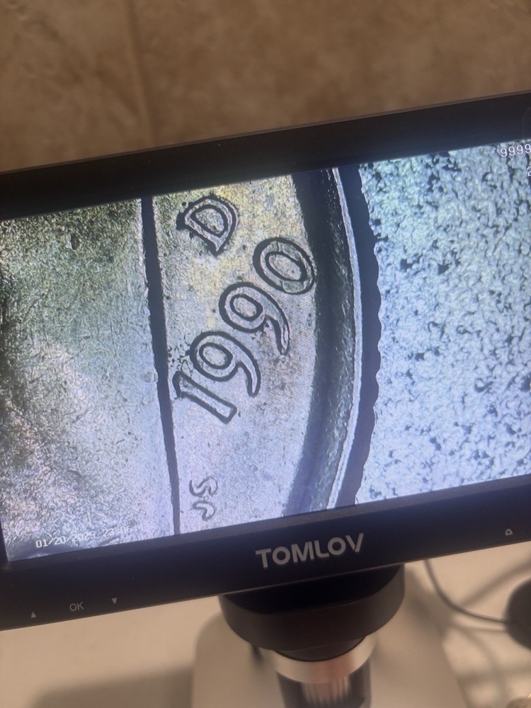 1990 d mint error missing letters and DDR in good condition