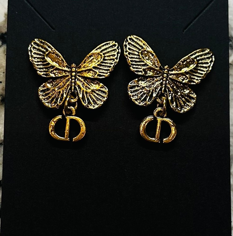 Adorable Dior antiqued CD Butterfly Dangle Earrings