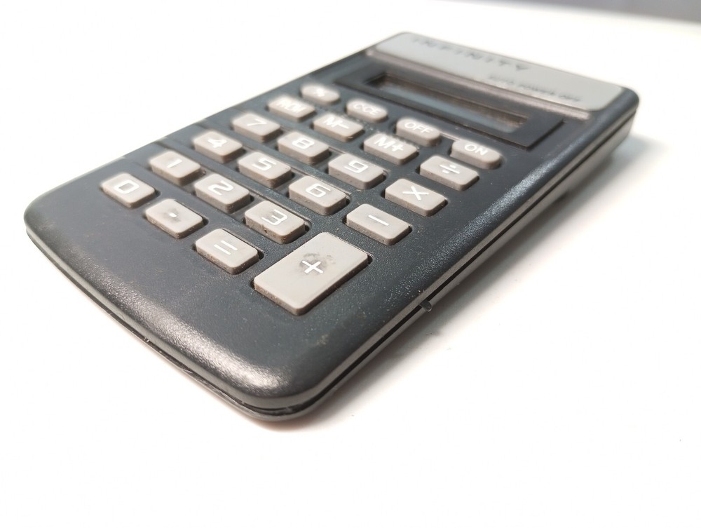 Vintage Infinity Personal Desktop Calculator with original box untested