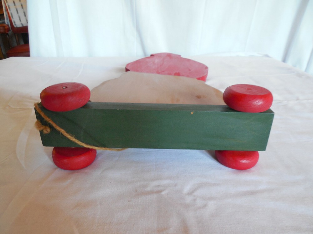 Hand painted folk art wood Santa pull toy