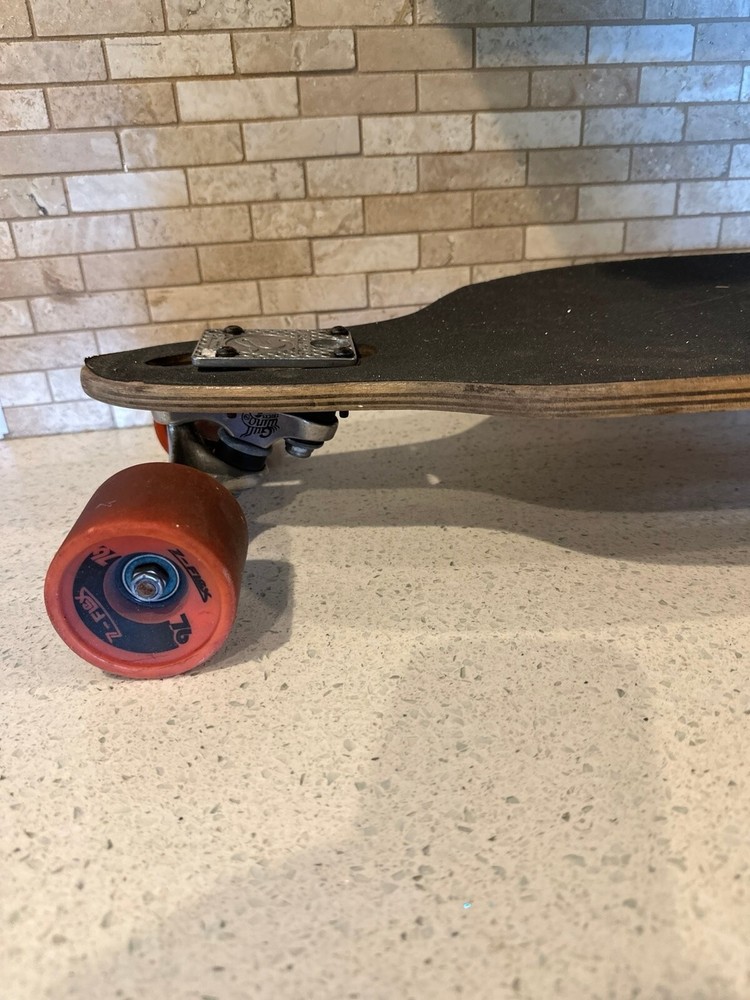 Catalyst longboard with gull wing trucks
