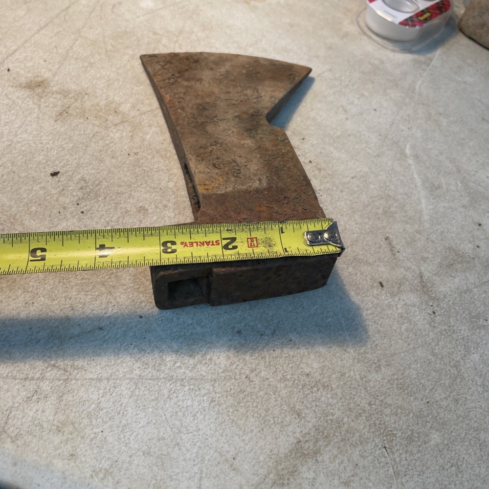Vintage axhead with tool holder