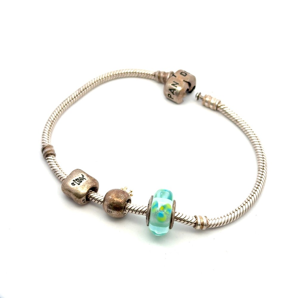 Authentic sterling silver pandora 8in bracelet with 3 charms