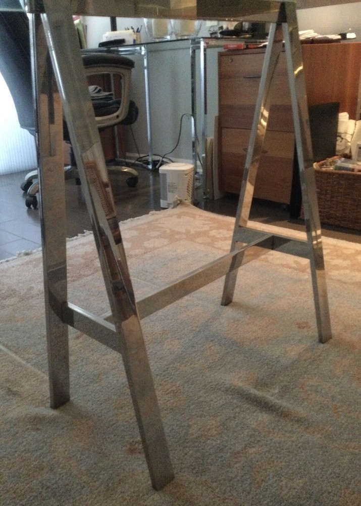 Heavy Glass Top Rectangular Dining Table. Beveled Edge. Stainless Steel Bases.