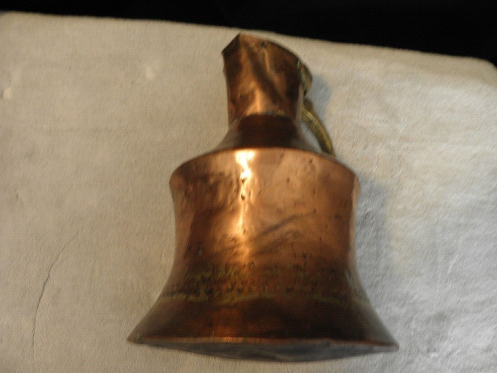 Vintage or antique copper jug