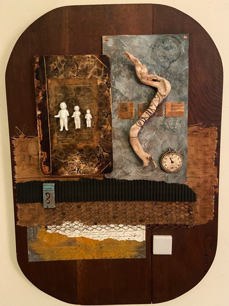 Fabric of Humanity by Canace.  Beautiful Assemblage/sculpture.