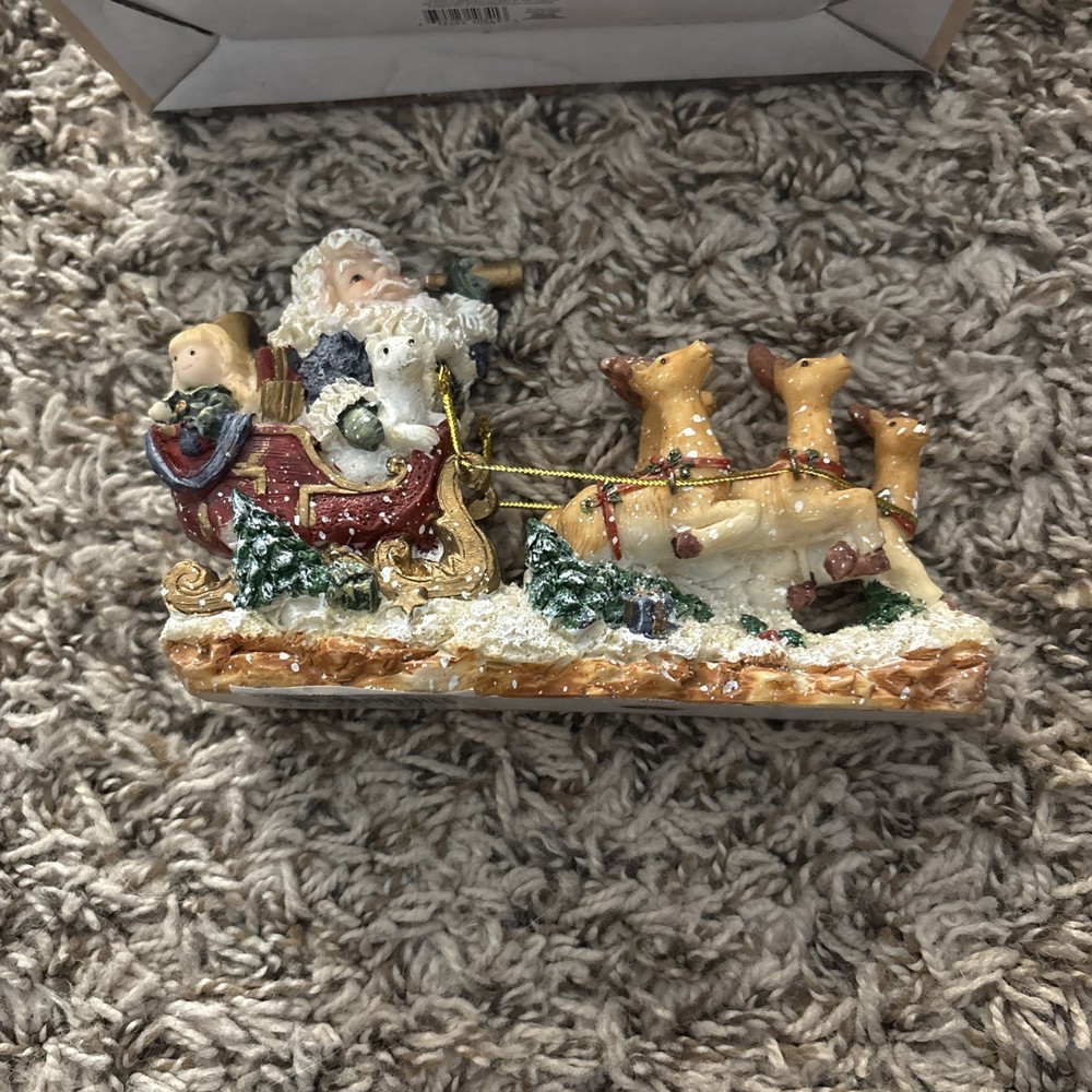 Santa On His Way Figurine 2003