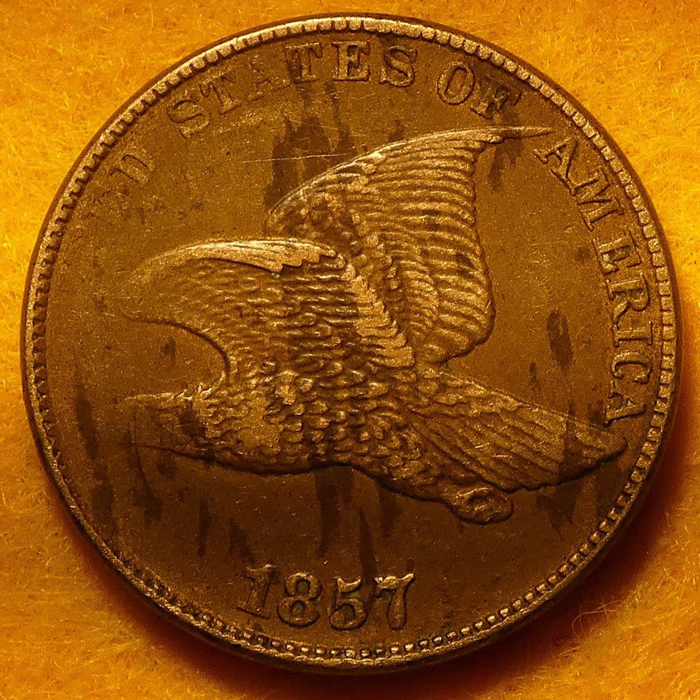 Sharp 1857 Flying Eagle Cent struck through grease. Nearly headless.