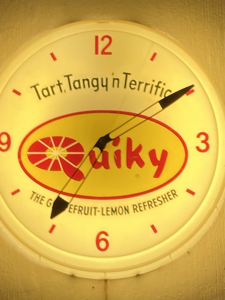 vintage advertising clock