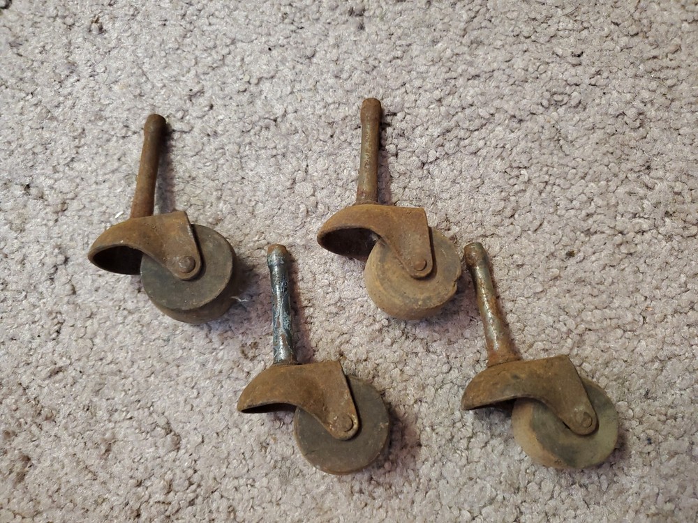 4 Vintage Wood and Metal Casters