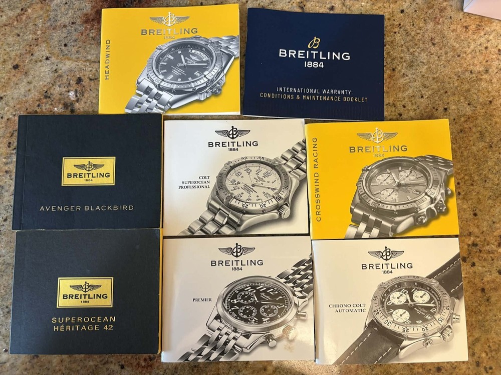 Breitling manuals, (16) Plus tags, Bezel Covers, Etc